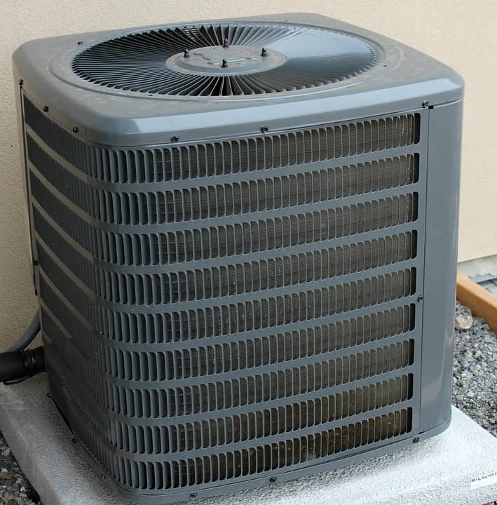 outdoor Air Conditioning Unit positioned outside of home