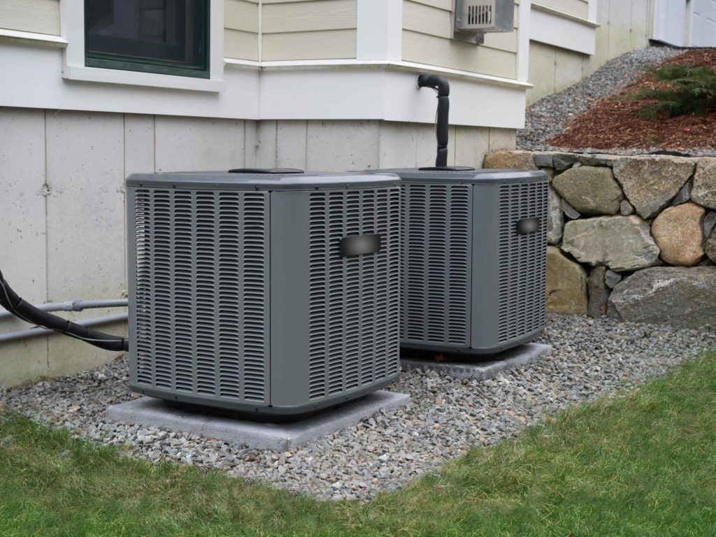 two ac units positioned outside of home in austin