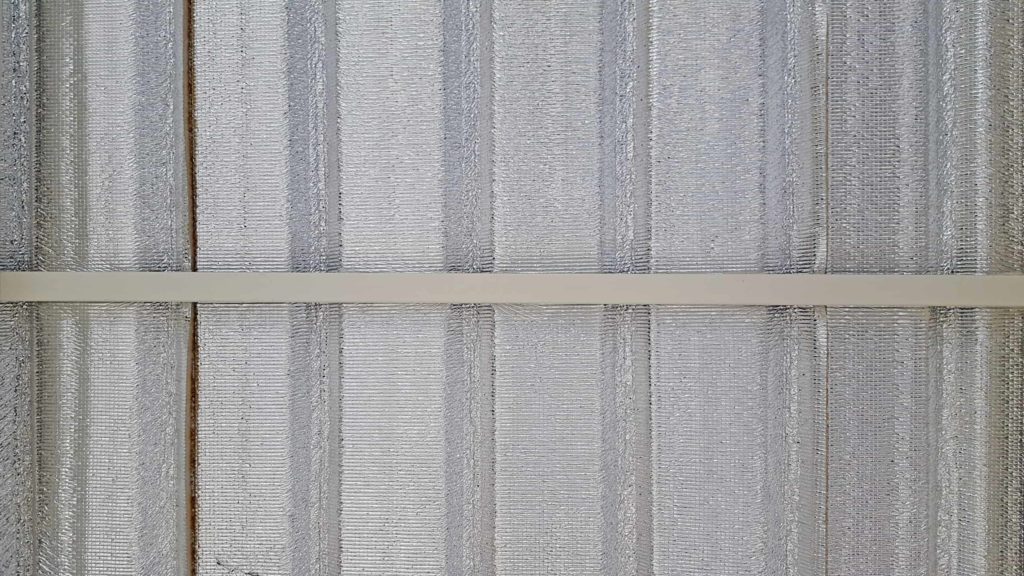 Silver roof insulation rough wrinkle foil texture